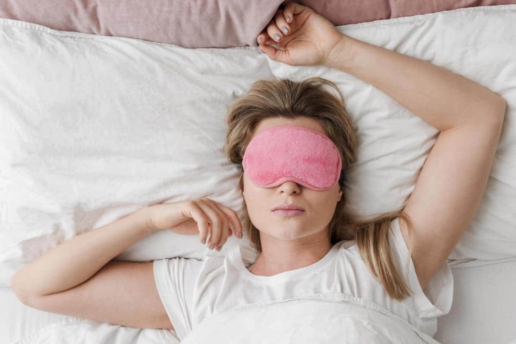 woman getting good sleep to minimize stress