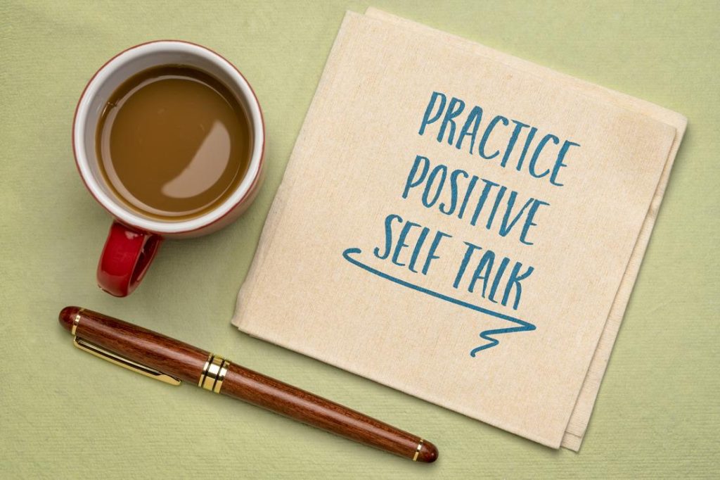 practice positive self talk written on napkin
